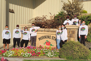 Morning Star colleagues posing in front of factory